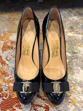 Salvatore Ferragamo Black Patent Leather Vara Bow Pumps with Gold Plate